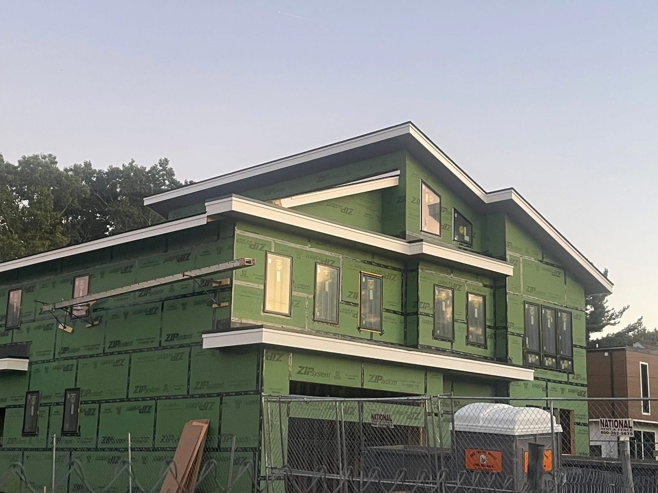 82 Lexington St mid-build: framed and weathertight